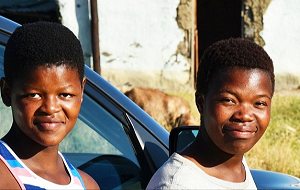 The image is of a young lady and her sister when they were young girls outside them grandmother’s small home in the old Transkei. How did this amazing young girl With no formal education how did Eve end up founding a successful company…Read-more